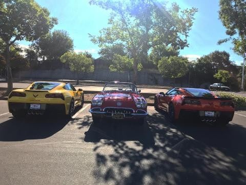 three parked vehicles
