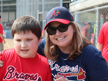 youth baseball player and mother
